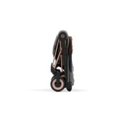 CYBEX Coya Rosegold Mirage Grey -Kinderreise Angebote Store cyb 23 int y090 coya migr rogo fold