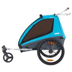 Thule Coaster XT Kinderanhänger Blue Umbaubar Zum Fahrradanhänger Und Kinderwagen 8 Thule Coaster XT Kinderanhänger Blue Umbaubar Zum Fahrradanhänger Und Kinderwagen -Kinderreise Angebote Store large thule coaster xt blue side 10101803